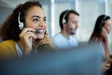 Employee using a headset to communicate with customers.